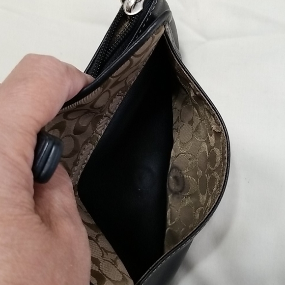 Almost Vintage Coach wristlet can hold a phone. - Picture 7 of 11